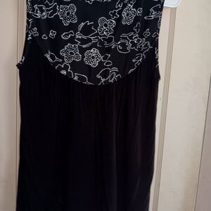 Size small, black with white flowers, sleeveless top